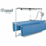 COMEL                                  .